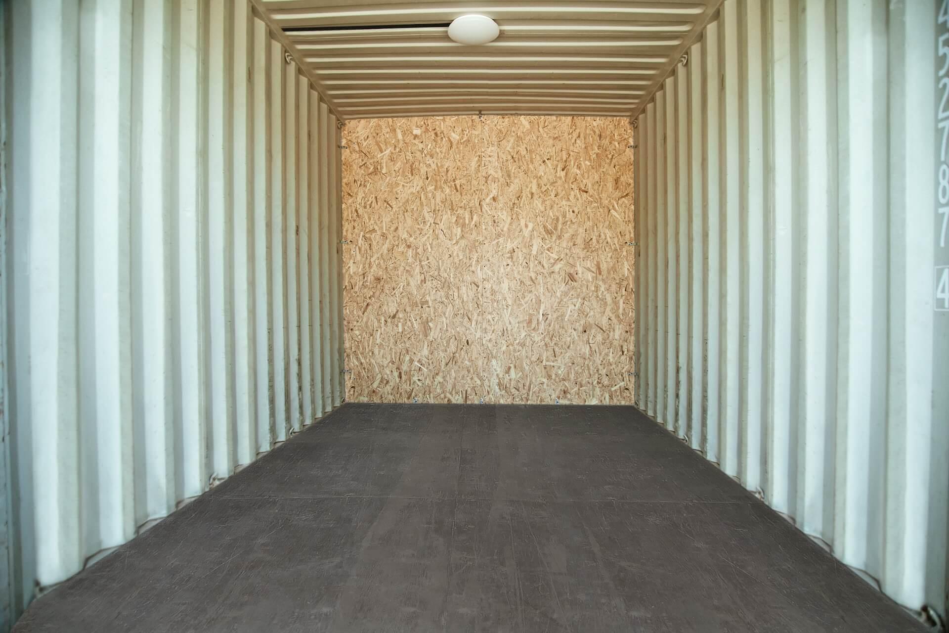 Storage container interior with furniture